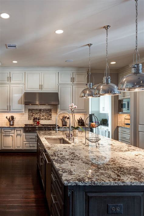 white cabinets with dark granite